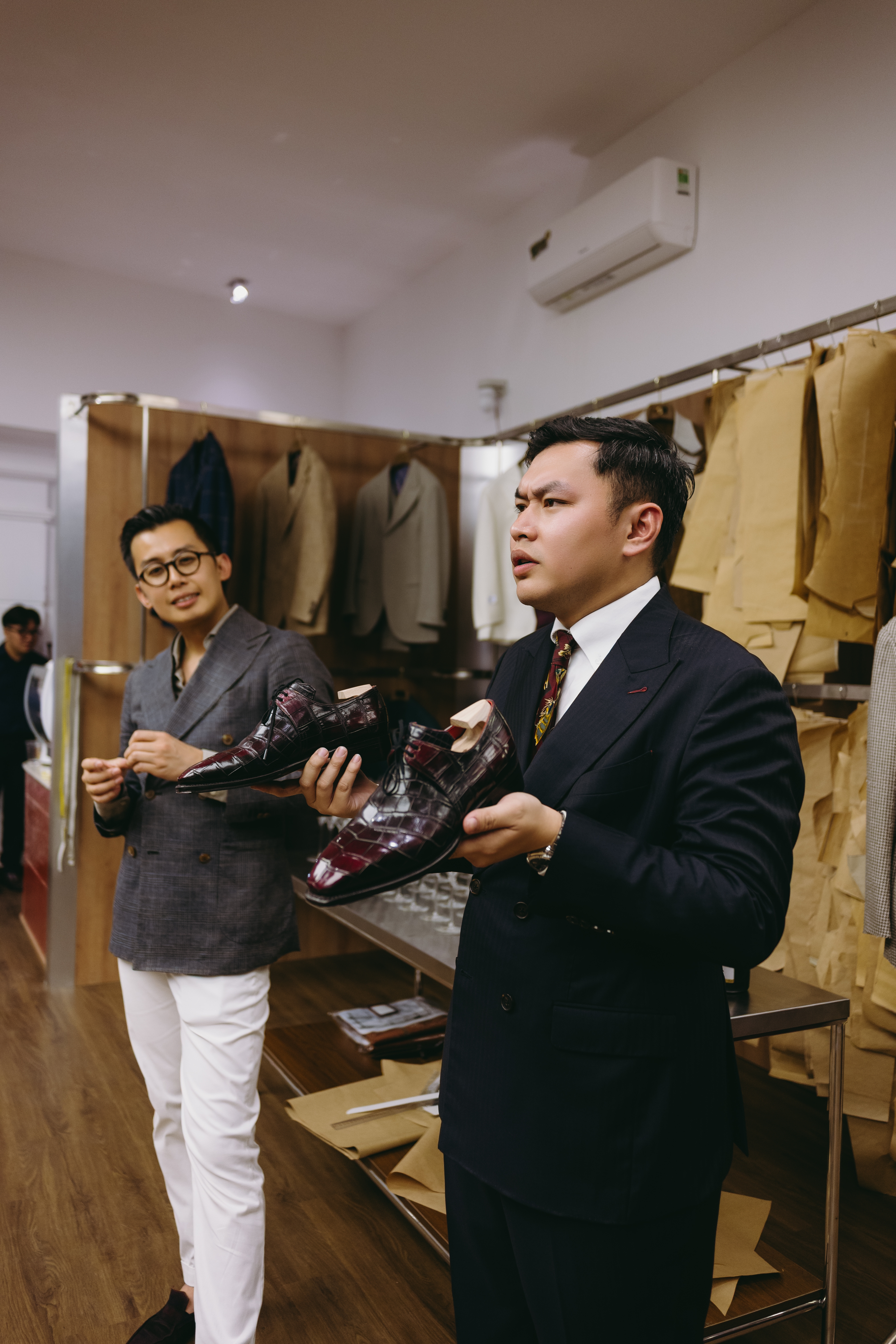 Guests watching the patina demonstration at Marcher Saigon