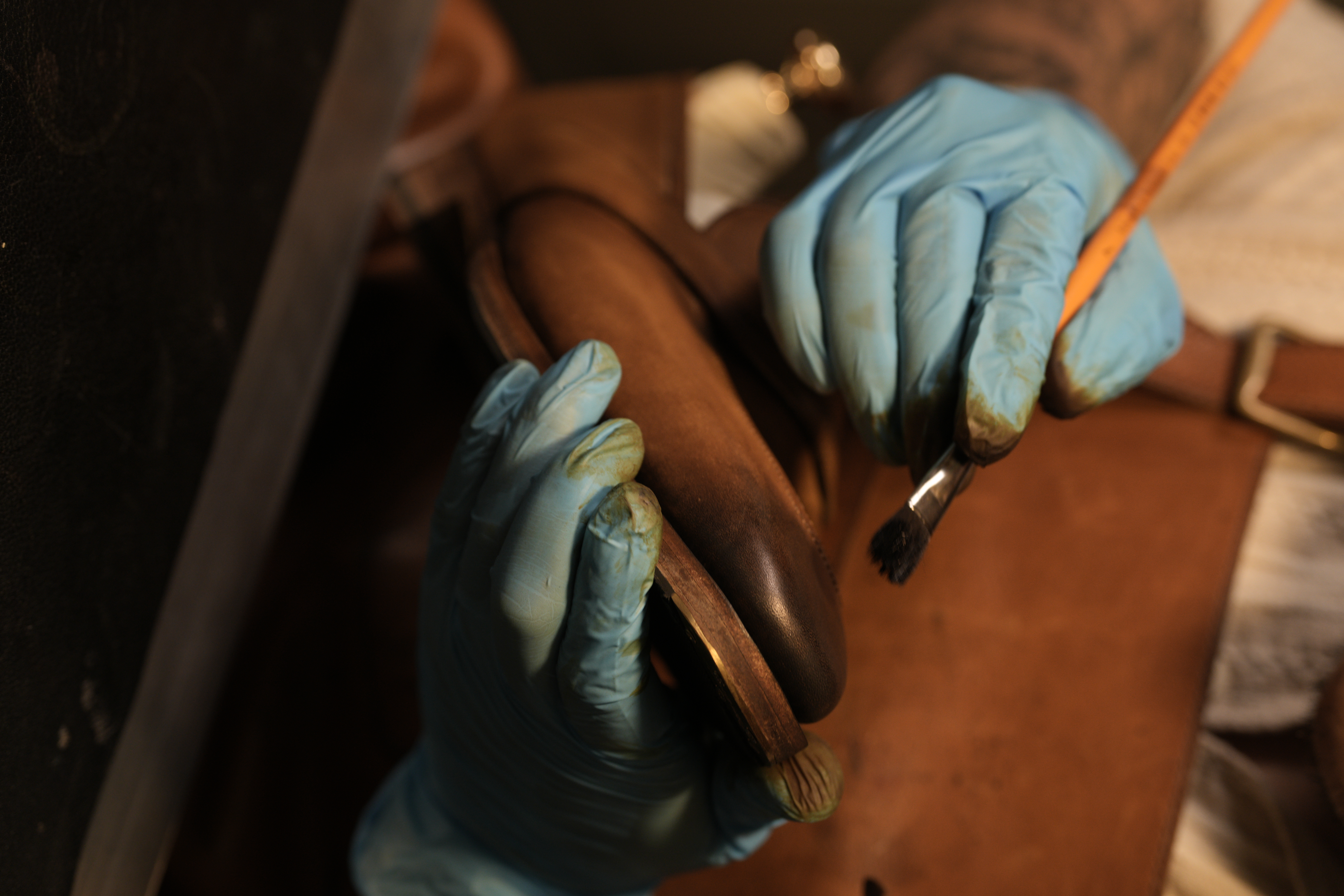 Detail — applying colour by brush at Marcher Saigon